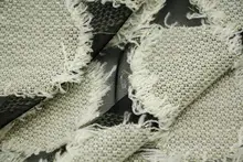 デザイン性のある薄手ストレッチ素材【ブラックメッシュ・米金色フリンジニット生地】