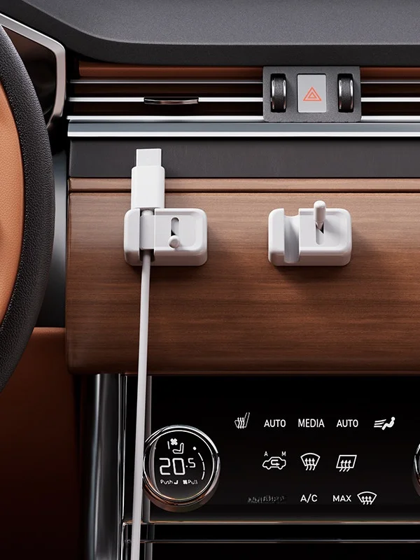 プッシュスイッチ式ケーブル整理器：デスク用データケーブルの巻き取りと収納を実現