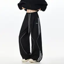 ワインレッド サイド ストライプのトレッキングパンツ【男女兼用・夏用・速乾・ヒップホップ・ジャズダンス・カジュアル・ワイドレッグ】