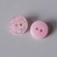 浅いピンクの光沢感あるポリエステルボタン【イギリス製・１５ｍｍ】