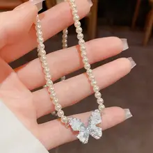 華やかなブルーのジルコンバタフライネックレス【パール付き・魅力的なデザイン・プレゼントにも最適】