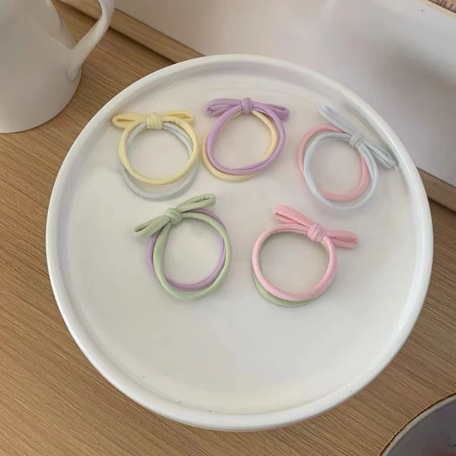 ポニーテール 巻く ための柔らかさと安定性を兼ね備えたバタフライリボンヘアゴムの実用性解析