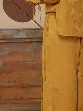 レトロな刺繍デザインの広がるパンツ【女性用・秋春向け・玉石付き・フィット】