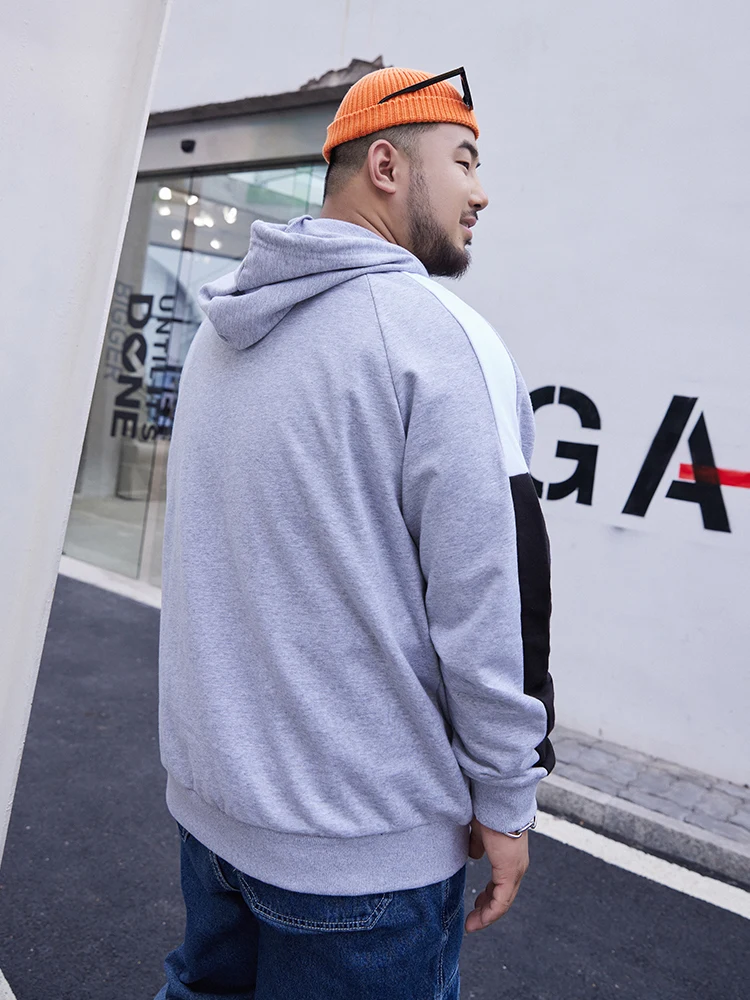 バイカラーのフード付きトレーナー：ゆったりデザインで秋の日常を快適に