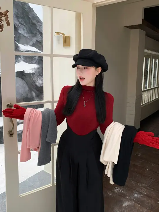 感あふれるデザインの黒いニットトップス【秋冬用・長袖・大きいサイズ】