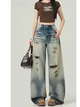 アメリカンヴィンテージ風の破れたデニムパンツ【夏用・女性・ゆったりワイドレッグ・デザイン性あり】