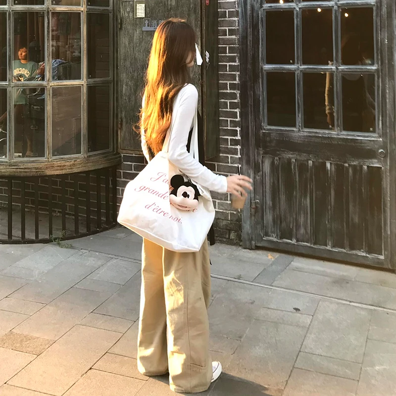 ハイウエストタックワイドパンツ：高腰設計と牛仔布の実用性を解説