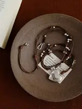ハンドメイド編み込みハートペンダントロングネックレス【カジュアル・ビーズデザイン・ヴィンテージ風】