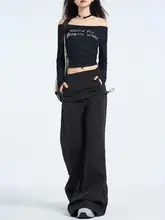 高腰のフィット黒のワイドレッグパンツ【スカート風・カジュアル・カンガルーポケット・偽二重デザイン】（セットアップ対応）