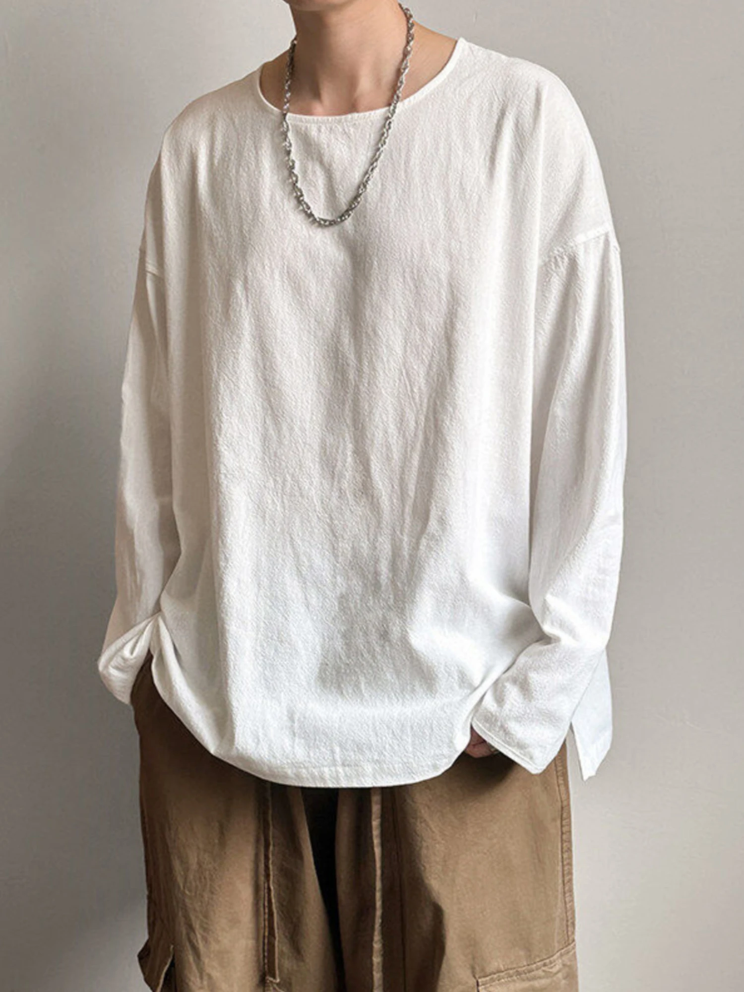オープンカラーシャツ オーバーサイズ：高級感漂う中国風ラウンドネック長袖Tシャツの実用性と着こなし