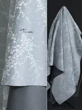 デザイン性の高い梅花柄生地のブルーグレーコート【抗皺・中国風・ファッション】
