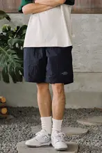 夏季カジュアルなゆったりデザインの速乾防水ビーチショートパンツ（セットアップ対応）
