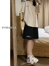 女性用 黒のカジュアルワイドレッグスポーツショートパンツ【薄手・夏用・ルーズフィット・ハーフレング ス】