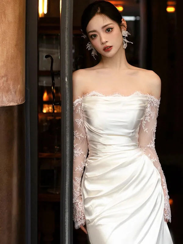 結婚式ゲストワンピースのデザイン例：フランス風白フィッシュテールレースドレス