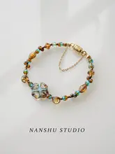 四葉クローバーデザインのヴィンテージ風ブレスレット【チェコ製ガラスビーズ・女性用】