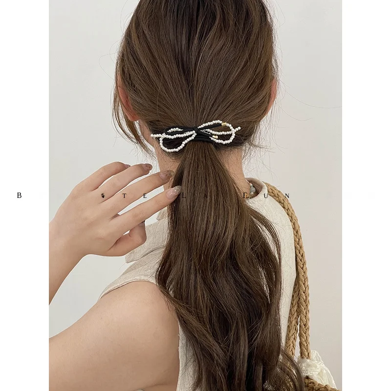 かぎ針で編むリボン小物の実用性：パールリボン付き高弾性ヘアゴムの使い方と性能解析