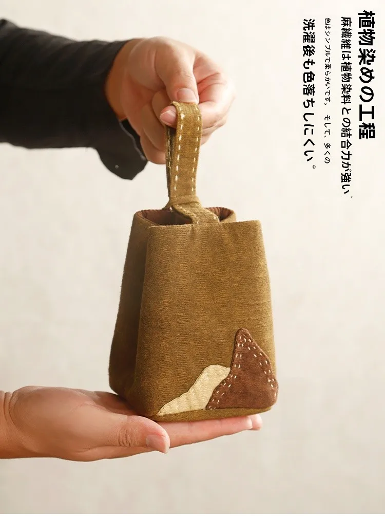 麻混合素材の手提げカップバッグ：旅行小物としての収納効率と耐久性の実証