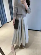 デザイン性のある不規則な裾の中長丈Aラインスカート【アセテート・女性用・春夏】