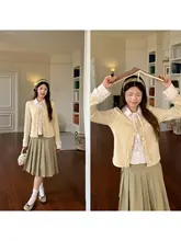 バイカラーのストライプニットトップス【フリル付き・リボンタイ・ゆったりフィット】