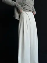 デザイン性の高い ストレートワイドパンツ【斜めボタン・プリーツデザイン】