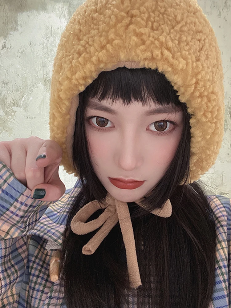 保温性と可愛さを兼ね備えたもこもこ冬帽子：耳あて付きひも付きタイプの実用性と性能解析