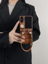 秋冬向けキャラデザインのカラメル色スマートフォンケース【折りたたみ式・防落下・個性的】
