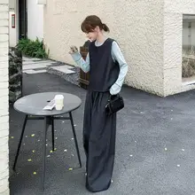 デザイン性のあるカジュアルベストとワイドパンツのコーディネート【春の雰囲気・シンプルな三点セット（セットアップ対応）】