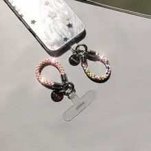 ミニスワロフスキー付きスマホストラップ【高級感のあるデザイン・指輪型短掛け・防盗・精緻な飾り】