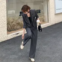 グレーの洗練されたスーツセット【秋春用・ハイウエスト・ワイドパンツ・シャツ】（セットアップ対応）