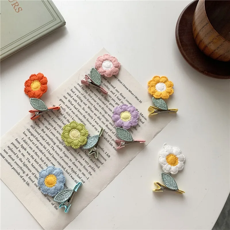 立体小花デザインのヘアクリップ：少女向けスプリングクリップの実用性とデザイン性