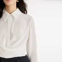 デザイン性の高い白シャツ【春秋用・腰丈】