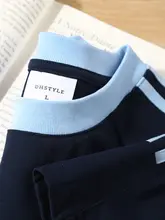 海軍ブルーの半袖Tシャツ【デザイン感あるラウンドネック・衿部分異素材】