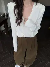 ホワイトニットトップス【Vネック・ゆったりシルエット・春秋用・薄手】