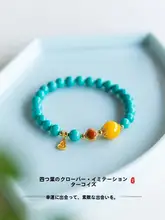 ターコイズビーズブレスレット【ブルー・四つ葉クローバーデザイン・天然ミツロウ使用】（セットアップ対応）