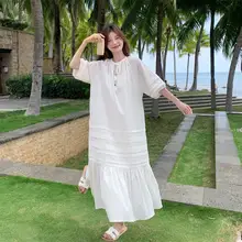 米白色のゆったりとしたウエストリボン付きフレアワンピース【清楚なデザイン・夏用】