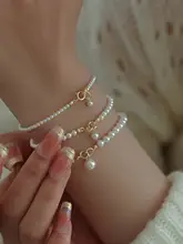 光沢感のあるパールビーズ ブレスレット【夏用・女性用・上品デザイン】