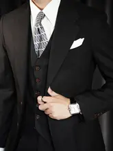 黒のクラシックな羊毛混紡スーツ【秋冬用・ビジネスカジュアル・結婚式対応】（セットアップ対応）