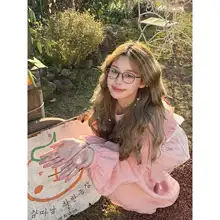 赤いチェックのワンピース 女性 秋の ゆったりし ランタンスリーブ 重ね着