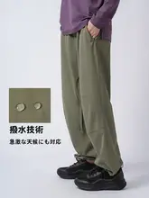 Zuoshan カスタマー アウトドア ソフト シェル アウターパンツ 男性と女性のための同じスタイル