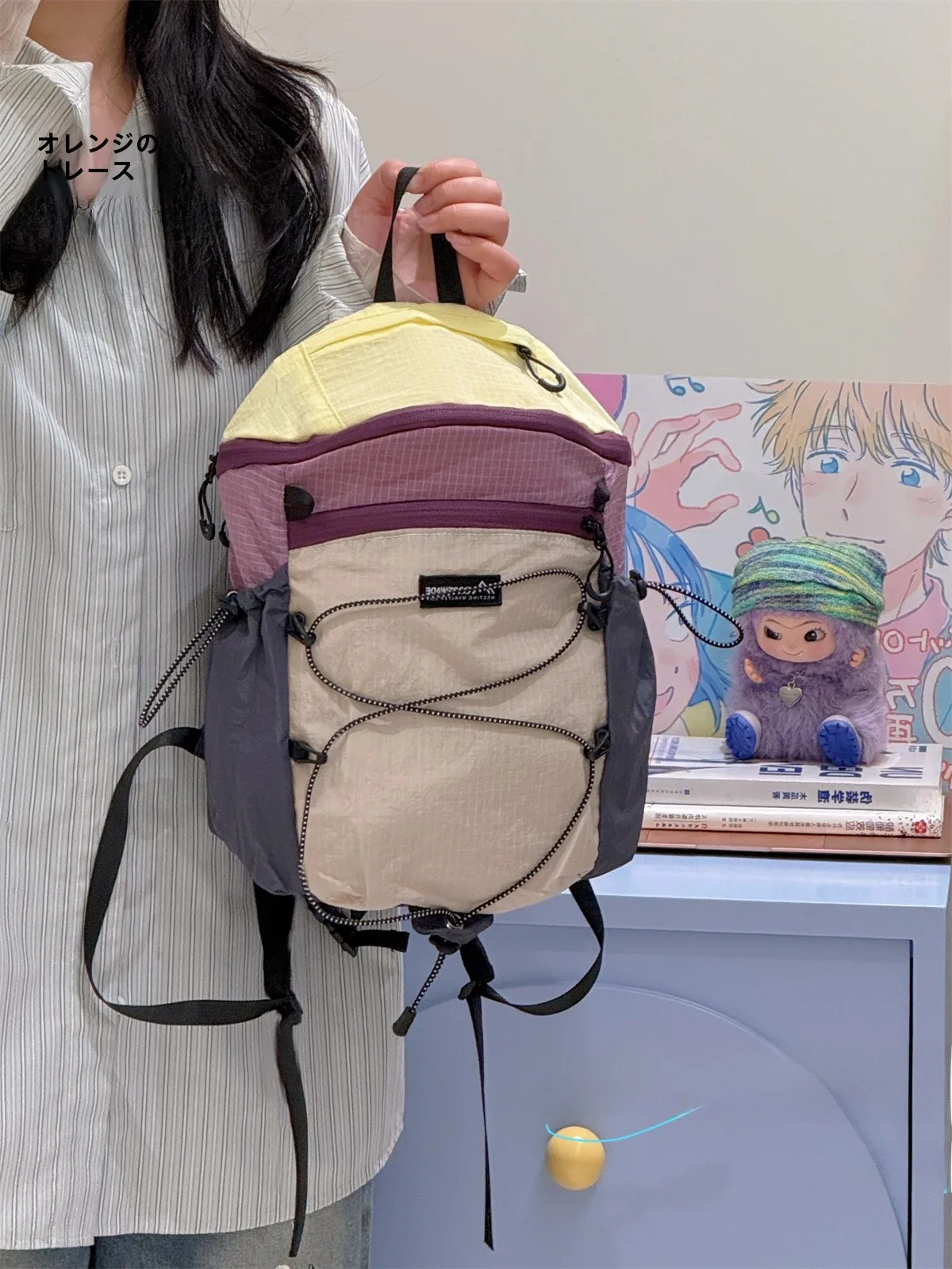オレンジ猫デザインのアウトドア用小型リュックサック：軽量・防水・通勤・登山に最適な機能解説