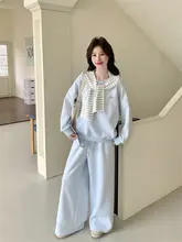 バイカラーストライプ刺繍スウェットシャツとフレアパンツのセットアップ（セットアップ対応）