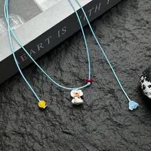 ブルーのレザーコードのドパミン小犬ネックレス【可愛いデザイン・引き伸ばし式・ロングスタイル】