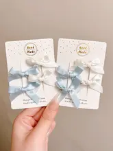 バレエ風リボンヘアクリップ【ダブルポニーテール・前髪用・可愛いデザイン】（セットアップ対応）
