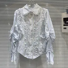 フレンチスタイルの美しい青いストライプのフリル装飾シャツ【春夏用・レディース】
