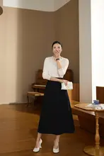 不規則なネックデザインのニットセーター【ドイツ羊毛】
