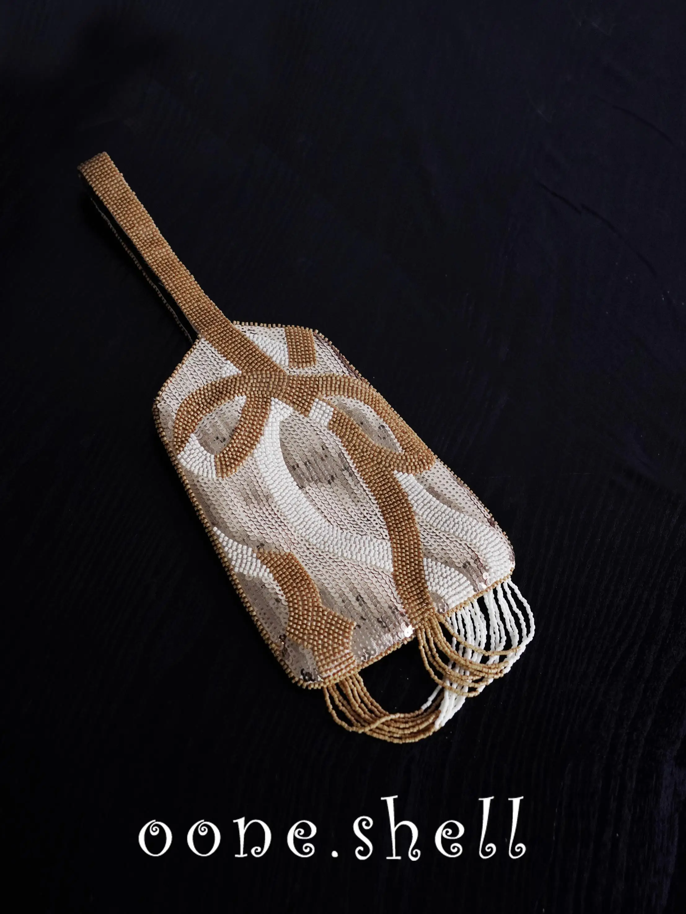 貝殻モチーフのハンド刺繍ビーズクラッチバッグ：ヴィンテージ風の多機能手挽包の実用性と使い分け