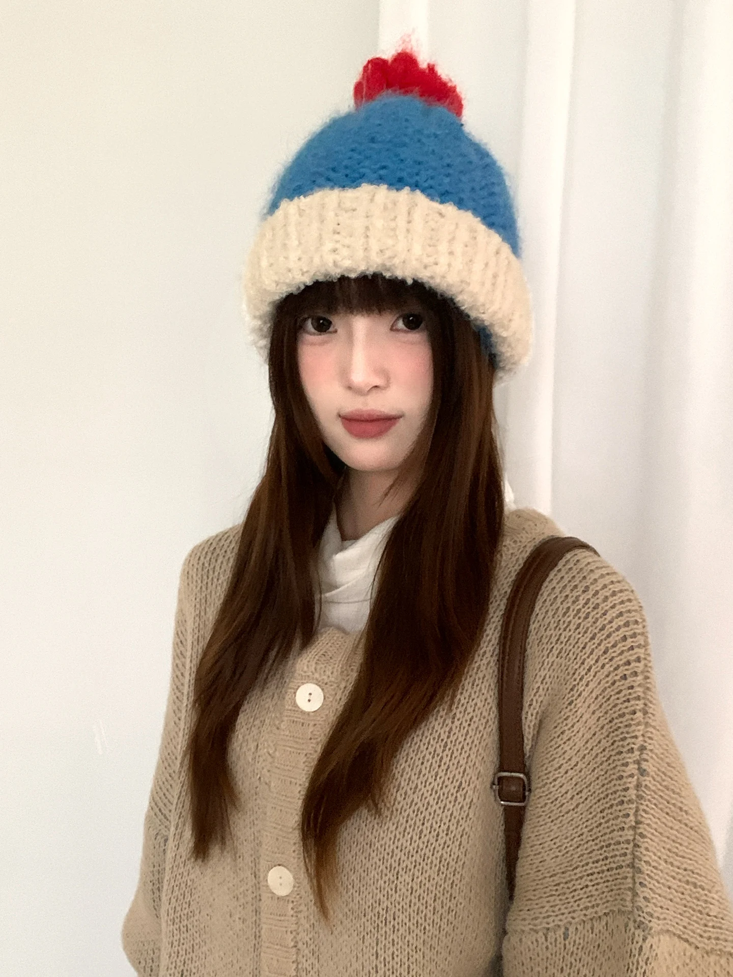 カラフルなポンポン付きニット帽：女性向け冬季用の保温性とデザインを徹底解説