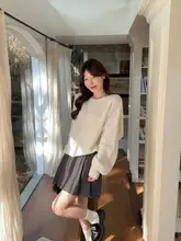 リボンデザインのゆったりとしたニットセーター【女性用・秋冬・クルーネック・独特なデザイン】