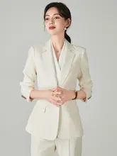 シンプルで洗練された白いスーツ【女性用・ビジネスカジュアル・フレアパンツ・ジャケット付き】（セットアップ対応）