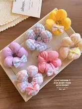 可愛い花モチーフの子供用ヘアゴム【バニライエロー・傷めない・女の子向け】